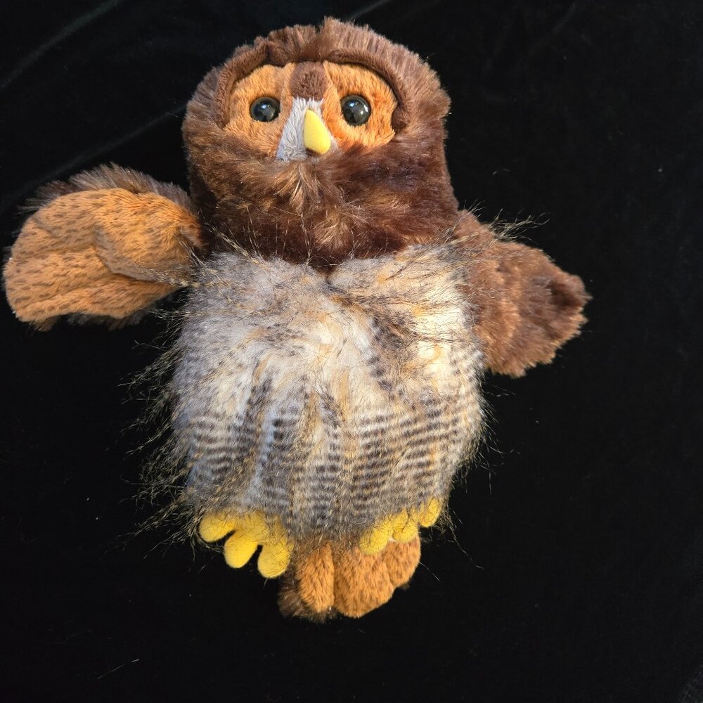 The item shown is a retired Ganz Webkinz Barred Owl plush toy, character code HM
